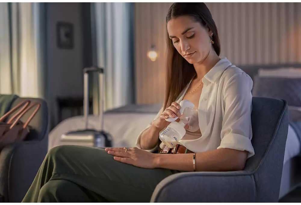 PHILIPS - Kit tire-lait manuel Simple avec biberon, coussinet d'allaitement & sachets de conservation