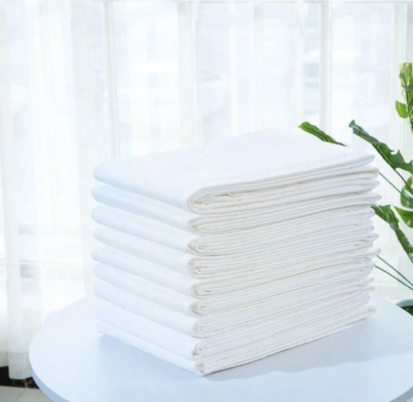 Tapis à langer jetables bébé – Lot 100 pièces Dakar Dialy