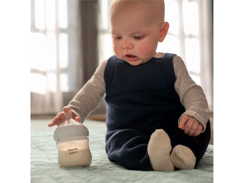PHILIPS AVENT -  Kit biberons pour nouveau-né – 4 biberons, 2 tétines, sucette ultra-douce et goupillon, 0-12 mois