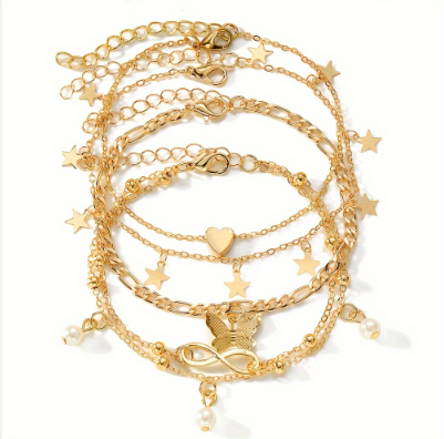 Ensemble de 4 s de cheville Boho Chic avec des breloques papillon, perle, étoile et symbole de l'infini - Bijoux de pied en alliage de zinc vintage pour femmes,