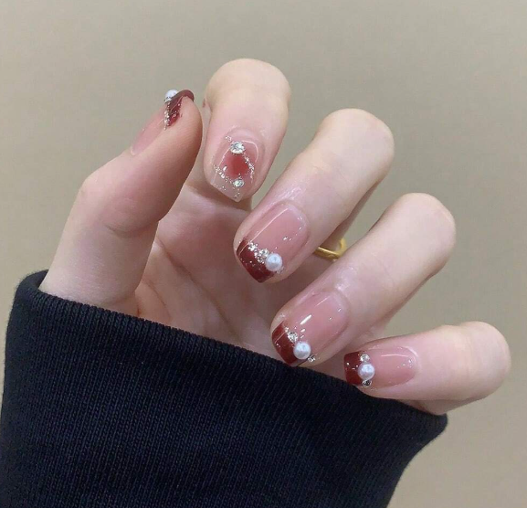 1 boîte de perles décoratives pour ongles
