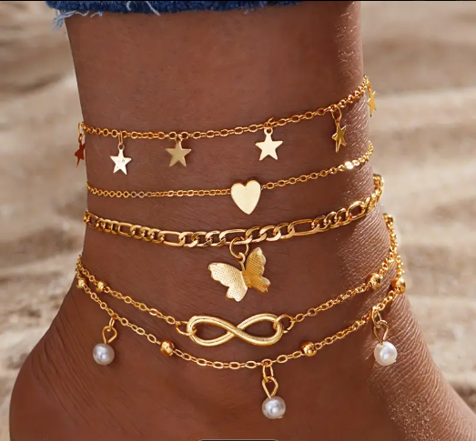 Ensemble de 4 s de cheville Boho Chic avec des breloques papillon, perle, étoile et symbole de l'infini - Bijoux de pied en alliage de zinc vintage pour femmes,