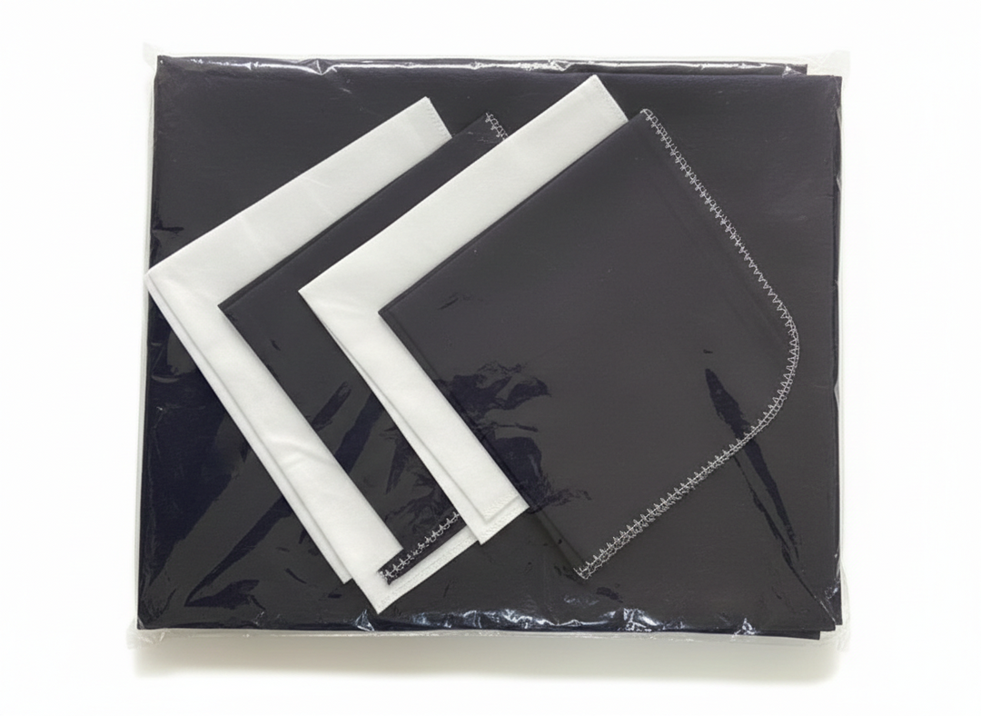 Nappe de table noire et 4 torchons noirs et blancs